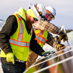 consumers energy workers installing solar